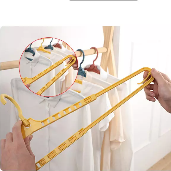 1 PC - 360 Degree Shrinkable Hangers for Clothes Swivel Hook Strong and Durable Clothes Hangers for Sheet Coats Pants (Random Color)
